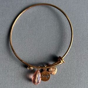 3/$20 Gold Tone Strength Bangle Bracelet